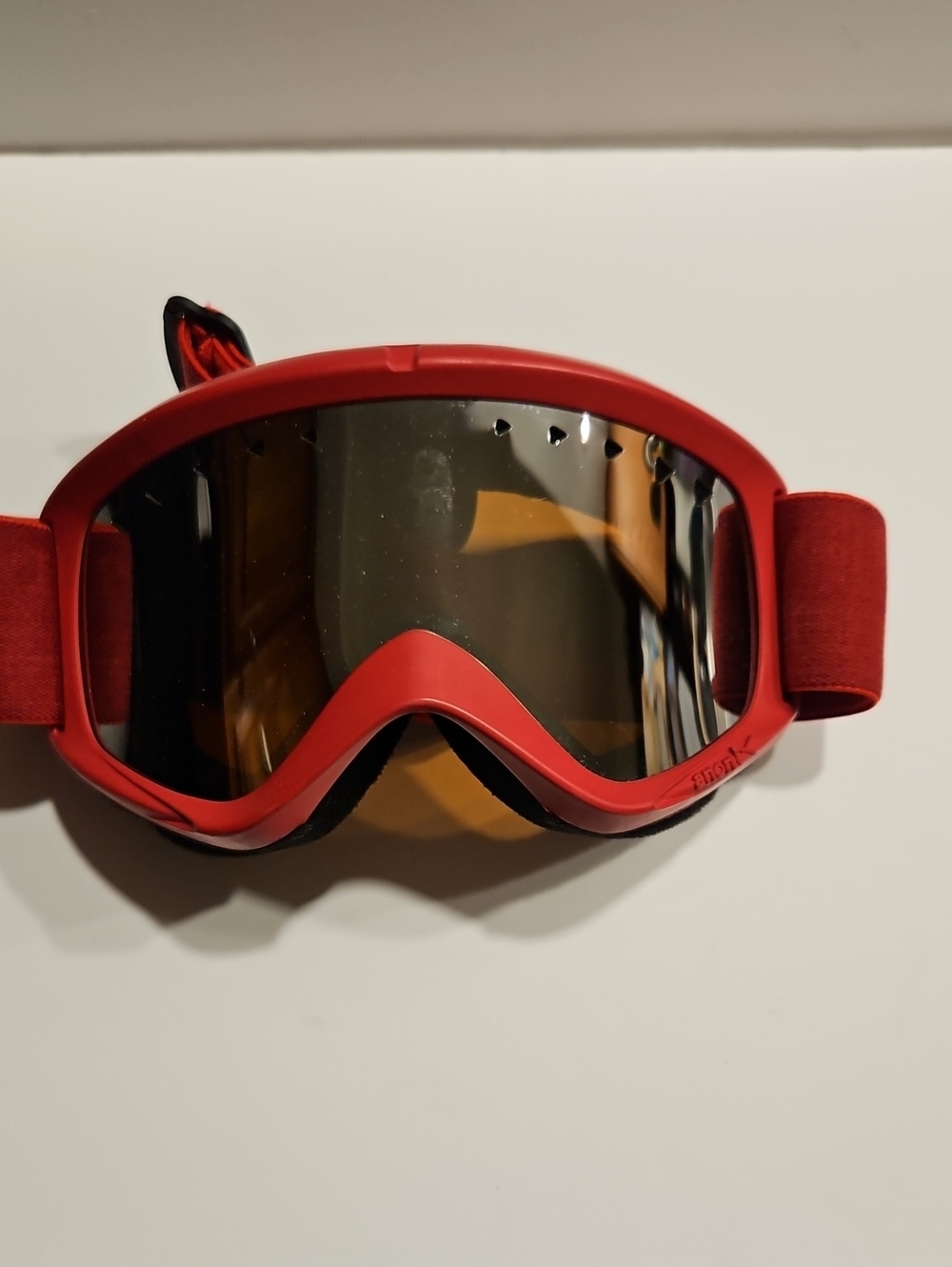 ANON Red Ski/Snowboarding Goggles with Tinted Lens .  Comes with case.